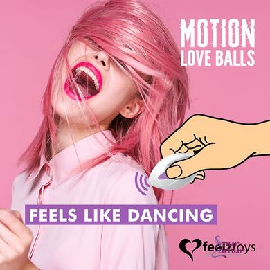 Вагінальні кульки з масажем і вібрацією FeelzToys Motion Love Balls Jivy з пультом дистанційного кер фото і опис