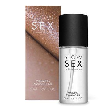 Розігрівальна їстівна масажна олія Bijoux Indiscrets Slow Sex Warming massage oil фото і опис